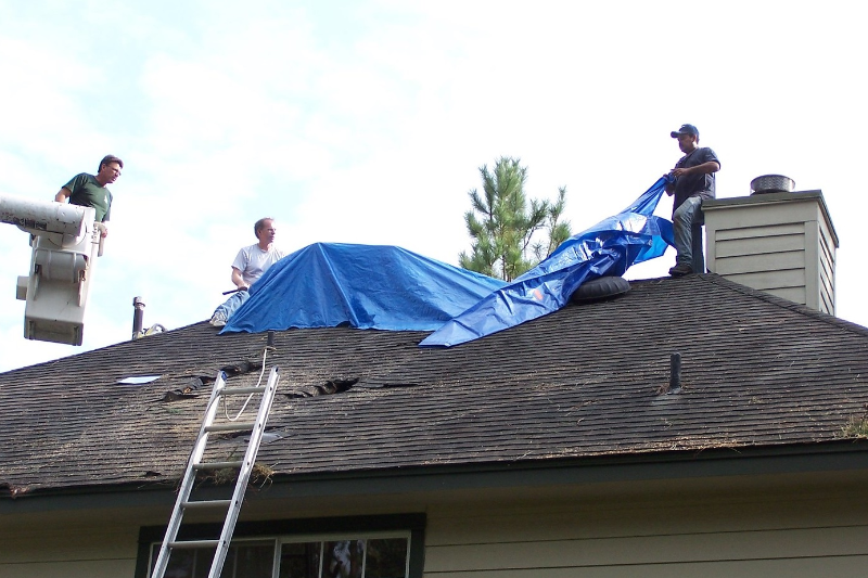 How to Tarp a Leaking Roof A StepbyStep Guide KTM Roofing Boston